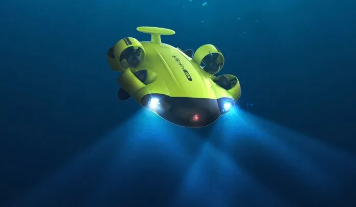A small yellow submarine floating in the ocean